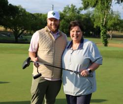 Lisa Cox and winner of golf putting contest