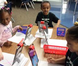 Parsons Pre-K students interact with the Osmos learning system
