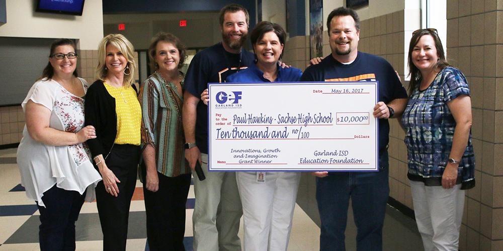 Paul Hawkins receives GEF grant check for $10,000