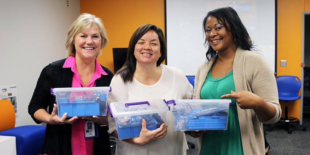 Teachers receive their Sphero Robotic Balls from the Garland Education Foundation