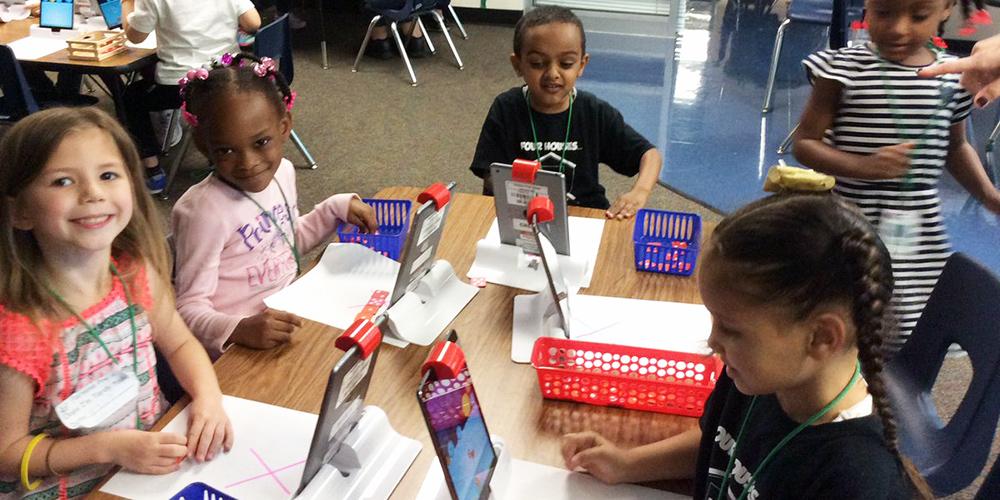 Parsons Pre-K students interact with the Osmos learning system