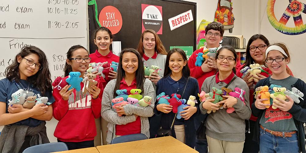 Brandenburg Middle School students pose with their "Sew Much Fun" creations
